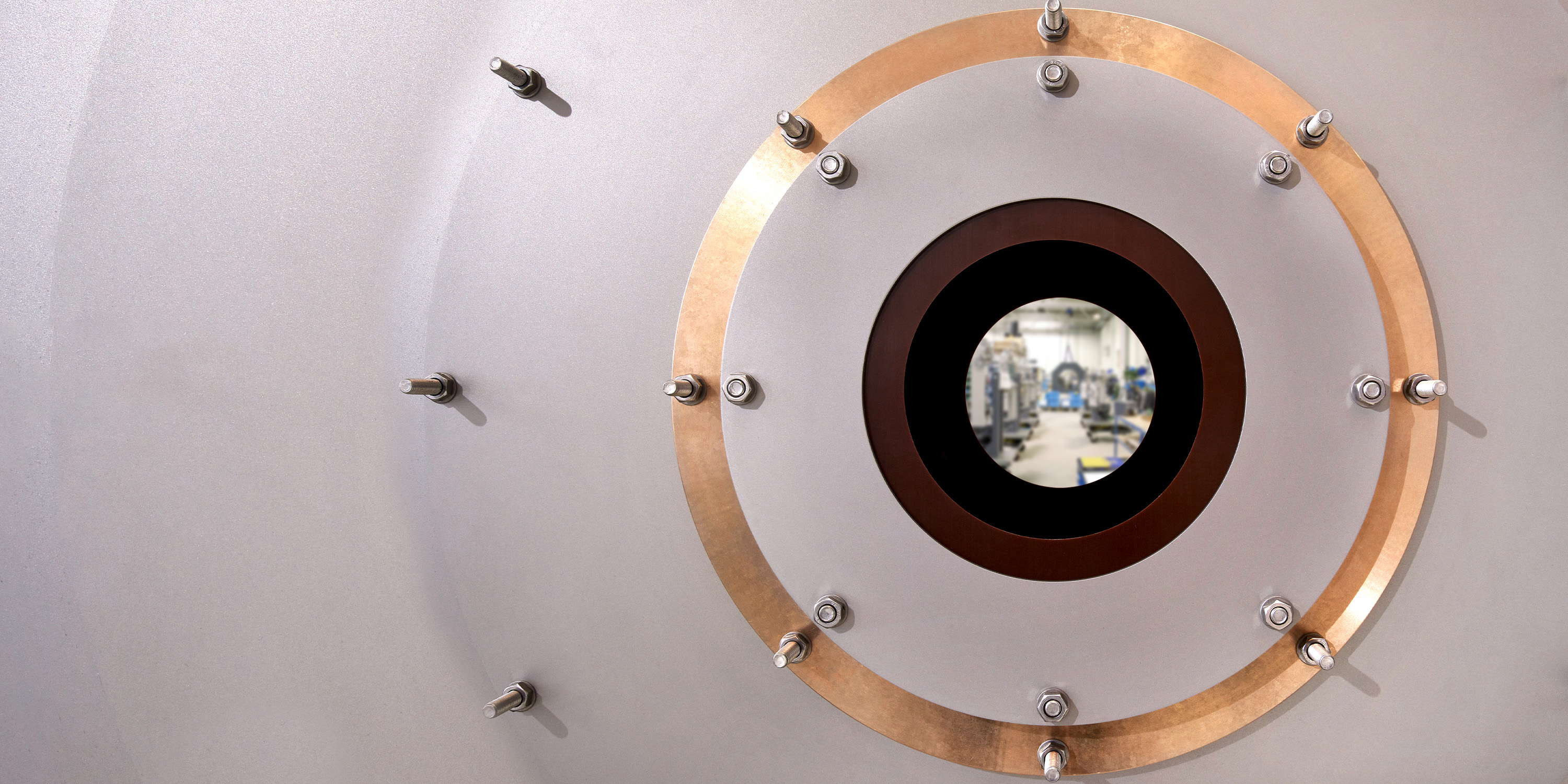 View of a workshop through the opening in the Aurex ultrasonic measuring device